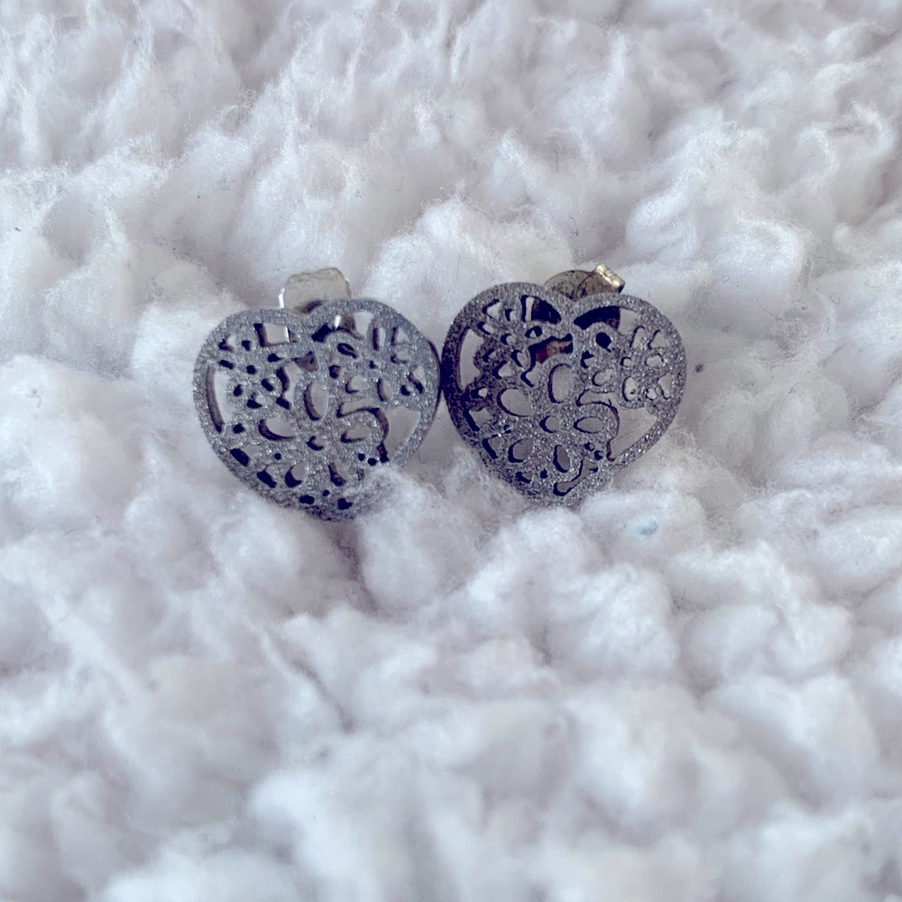 Heart stainless steel studs.